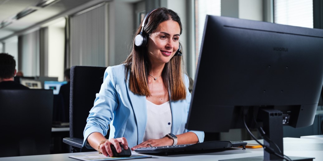 Customer support employee at work Customer support employee at work