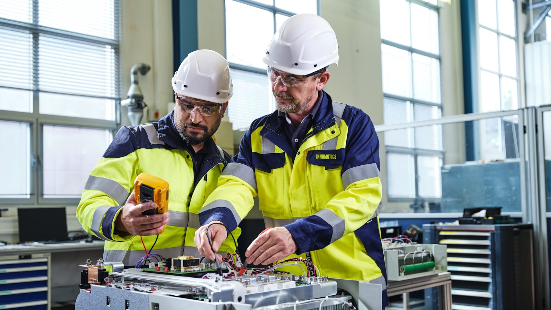 Two Innomotics repair service workers at work Two Innomotics repair service workers at work